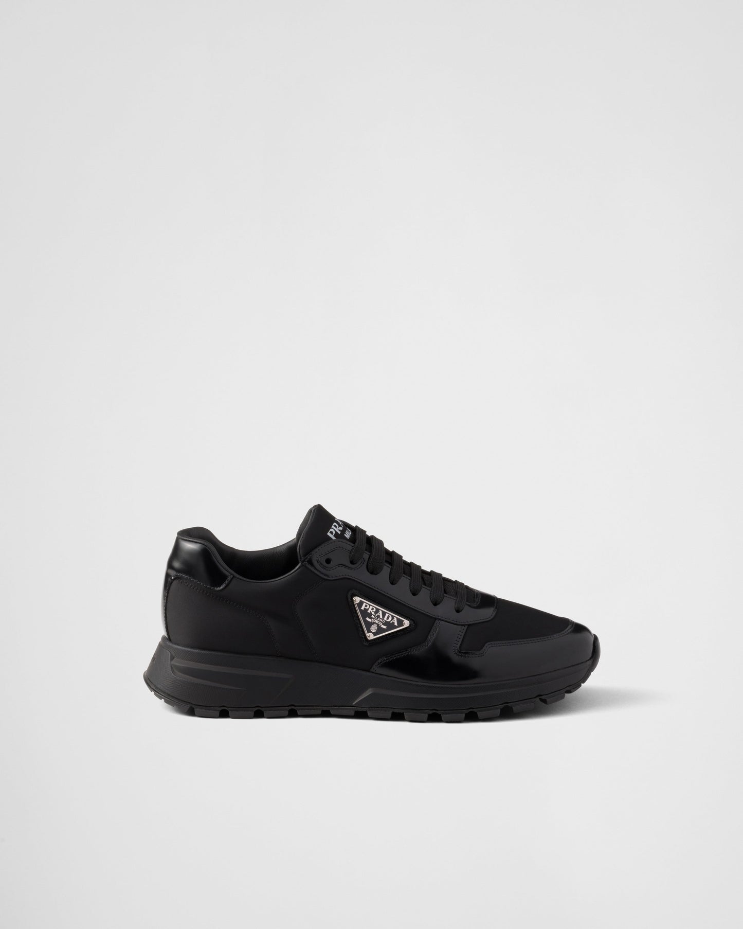 Prada – Schwarze Sneakers aus gebürstetem Leder 